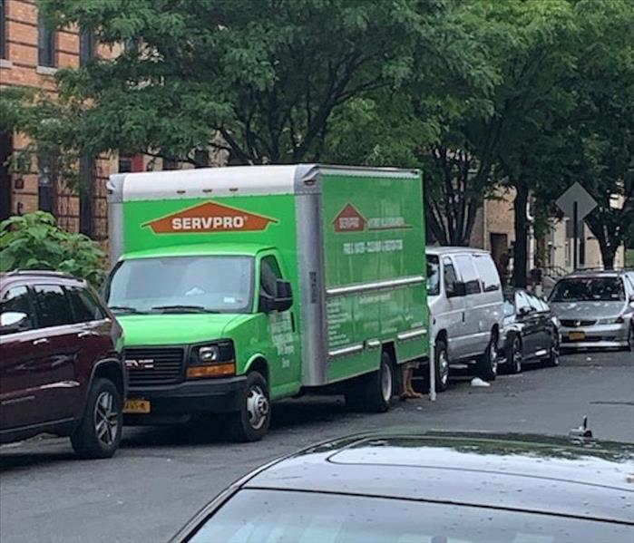 SERVPRO vehicle outside job site.